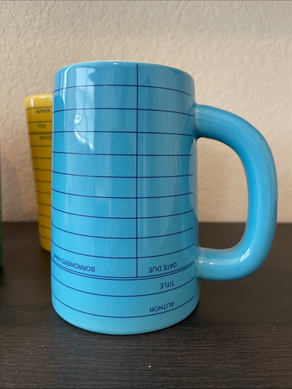 Out of Print Orange, Green, Yellow & Blue Library Card Ceramic Mugs - Picture 6 of 8